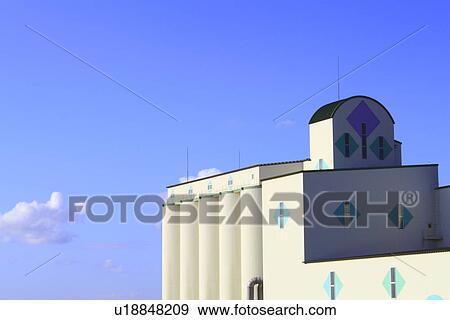 Stock Photo - White Building Against Blue Sky. Fotosearch