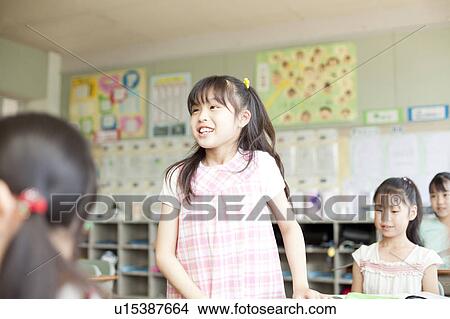 Woman Answering in Classroom View Large Photo Image Picture - Woman Answering in Classroom. Fotosearch