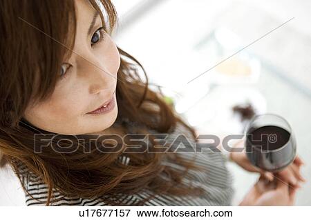 Stock Photo - Woman Having Red Wine. Fotosearch