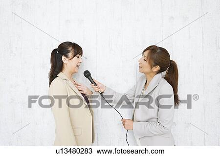 Woman Interviewing Another Woman View Large Photo Image Stock Image - Woman Interviewing Another Woman. Fotosearch