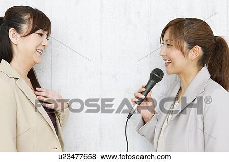Woman Interviewing Another Woman View Large Photo Image Stock Photo - Woman Interviewing Another Woman. Fotosearch