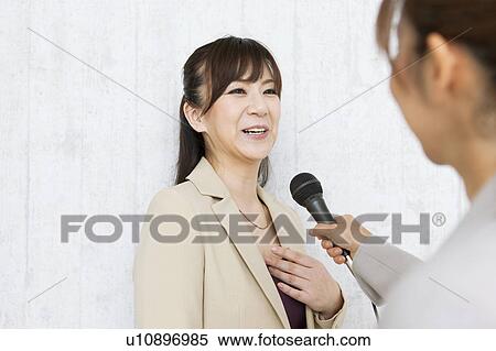 Woman Interviewing Another Woman View Large Photo Image Stock Photography - Woman Interviewing Another Woman. Fotosearch