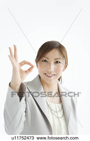Woman Making Ring with Fingers View Large Photo Image Stock Image - Woman Making Ring with Fingers. Fotosearch