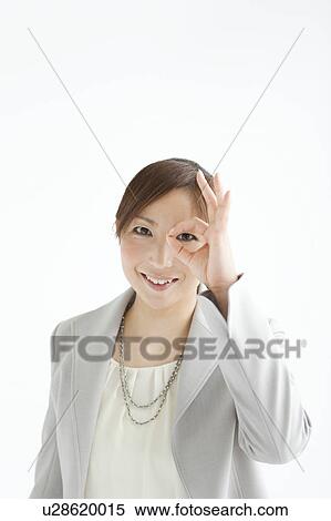 Stock Photography - Woman Making Ring with Fingers. Fotosearch