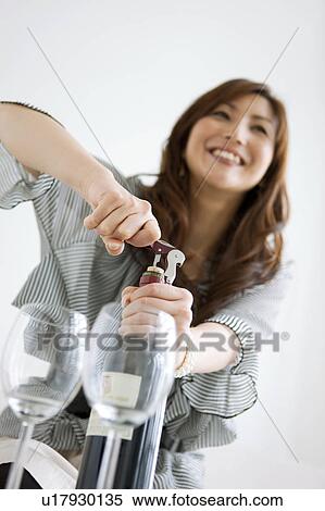 Woman Opening Red Wine Bottle View Large Photo Image Stock Photography - Woman Opening Red Wine Bottle. Fotosearch