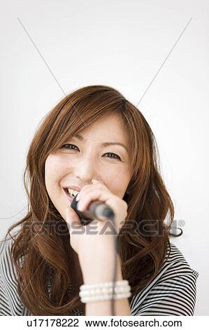 Stock Image - Woman Singing. Fotosearch
