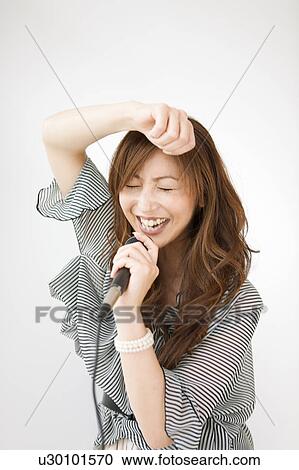 Stock Image - Woman Singing. Fotosearch