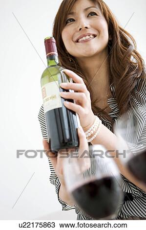 Woman with Wine Bottle View Large Photo Image Stock Image - Woman with Wine Bottle. Fotosearch