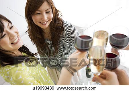 Women Toasting with Wine View Large Photo Image Stock Photo - Women Toasting with Wine. Fotosearch