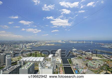 Stock Image - Yokohama Harbour Seen from Yokohama Landmark Tower. Fotosearch