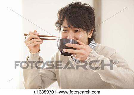 Young Man Eating View Large Photo Image Stock Image - Young Man Eating. Fotosearch