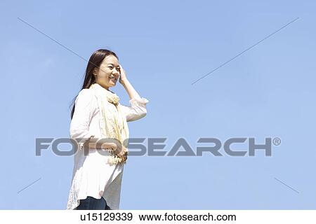 Stock Photo - Young Woman. Fotosearch