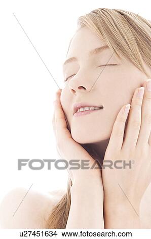 Young woman with eyes closed View Large Photo Image Picture - Young woman with eyes closed. Fotosearch