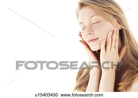 Young woman with eyes closed View Large Photo Image Stock Image - Young woman with eyes closed. Fotosearch