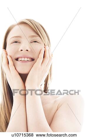 Young woman with hand on chin View Large Photo Image Stock Photo - Young woman with hand on chin. Fotosearch