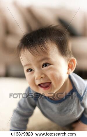 Stock Photo - Baby Boy Crawling. Fotosearch