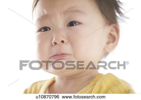 Stock Photograph - Baby Boy Crying. Fotosearch