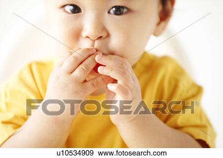 Baby Boy Eating View Large Photo Image Stock Photo - Baby Boy Eating. Fotosearch