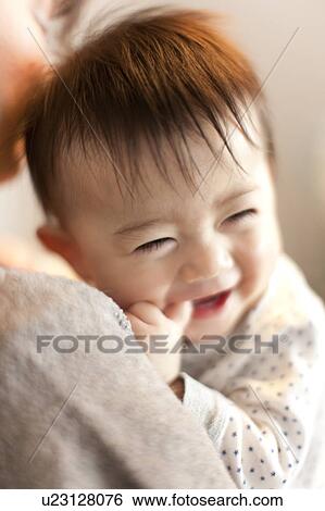 Baby Boy in Mother's Arms View Large Photo Image Stock Photograph - Baby Boy in Mother's Arms. Fotosearch