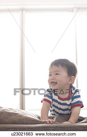 Baby Boy on Sofa View Large Photo Image Stock Image - Baby Boy on Sofa. Fotosearch