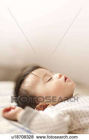 Stock Photo - Baby Boy Sleeping. Fotosearch