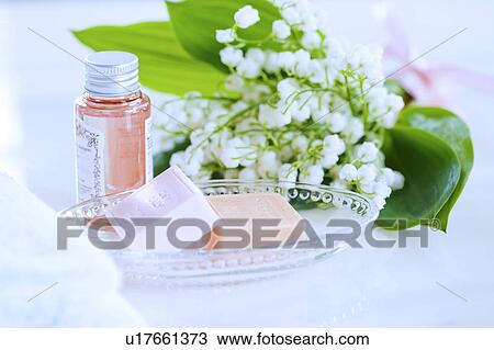 Bunch of Lily-of-the-valleys and Toiletries View Large Photo Image Stock Image - Bunch of Lily-of-the-valleys and Toiletries. Fotosearch