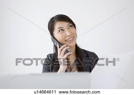 Businesswoman on cell phone View Large Photo Image Stock Image - Businesswoman on cell phone. Fotosearch