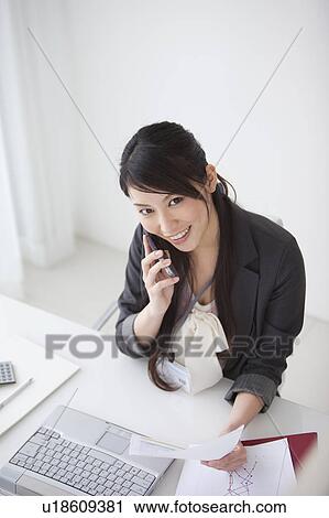 Businesswoman on cell phone View Large Photo Image Stock Image - Businesswoman on cell phone. Fotosearch