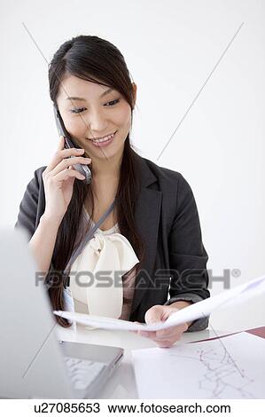 Businesswoman on cell phone View Large Photo Image Stock Image - Businesswoman on cell phone. Fotosearch
