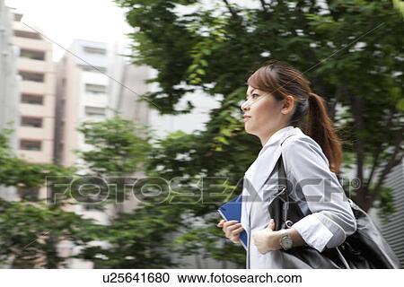 Businesswoman running View Large Photo Image Stock Image - Businesswoman running. Fotosearch