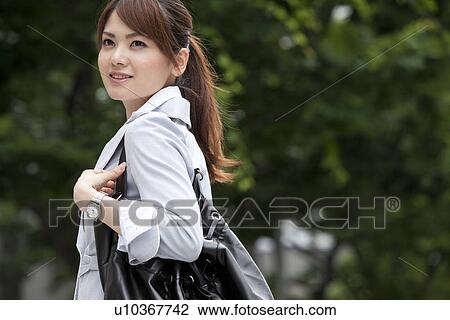 Stock Image - Businesswoman smiling. Fotosearch