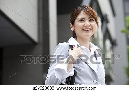 Stock Photo - Businesswoman smiling. Fotosearch