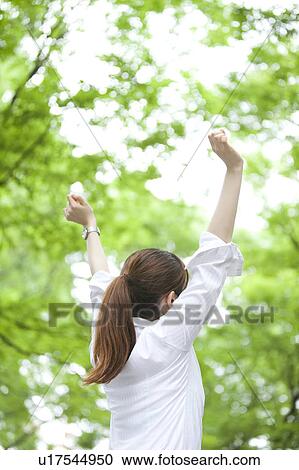 Businesswoman stretching View Large Photo Image Stock Image - Businesswoman stretching. Fotosearch