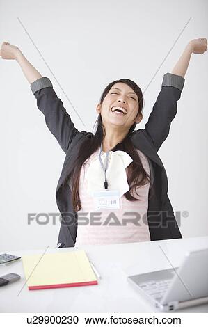 Businesswoman stretching View Large Photo Image Stock Image - Businesswoman stretching. Fotosearch