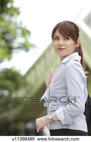 Businesswoman turning View Large Photo Image Stock Photo - Businesswoman turning. Fotosearch