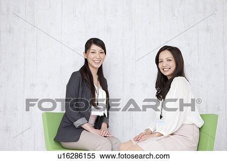Businesswomen having a meeting View Large Photo Image Stock Photography - Businesswomen having a meeting. Fotosearch