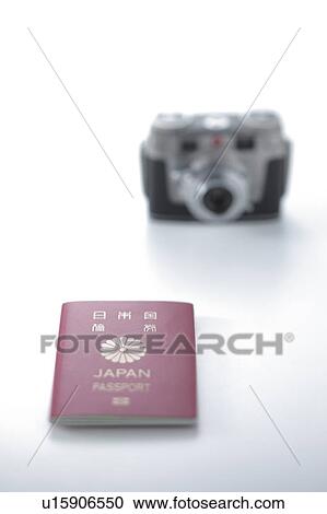 Stock Image - Camera and Japanese Passport. Fotosearch