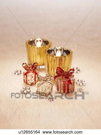 Candles and Christmas Presents View Large Photo Image Picture - Candles and Christmas Presents. Fotosearch