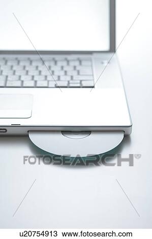 Stock Image - CD in Laptop. Fotosearch