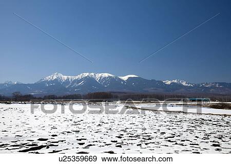 Clear Sky Over Yatsugatake Mountains and Rice Paddy in Winter View Large Photo Image Stock Photo - Clear Sky Over Yatsugatake Mountains and Rice Paddy in Winter. Fotosearch