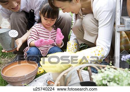 Picture - Family gardening. Fotosearch
