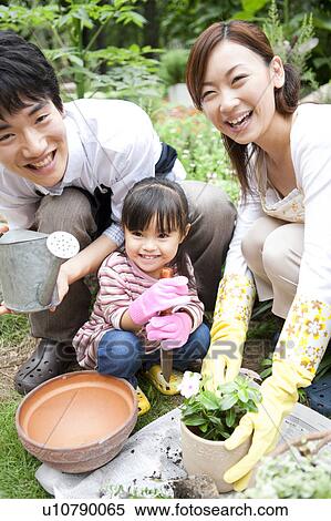 Family gardening View Large Photo Image Stock Photography - Family gardening. Fotosearch