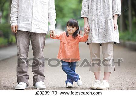 Family holding hands View Large Photo Image Stock Photo - Family holding hands. Fotosearch
