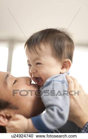 Stock Image - Father and Baby Boy. Fotosearch