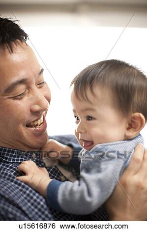 Stock Photograph - Father and Baby Boy. Fotosearch