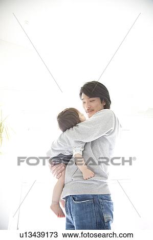 Father Carrying Sleeping Baby View Large Photo Image Stock Image - Father Carrying Sleeping Baby. Fotosearch