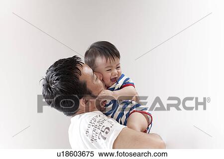 Father Kissing Baby Boy View Large Photo Image Stock Photography - Father Kissing Baby Boy. Fotosearch