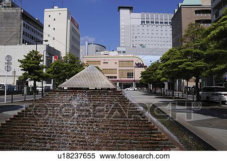 Stock Photography - Fountain in front of Chiba chuo station, Chiba City, Chiba Prefecture, Honshu, Japan. Fotosearch
