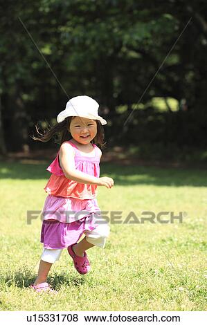 Girl Running in Park View Large Photo Image Stock Photo - Girl Running in Park. Fotosearch