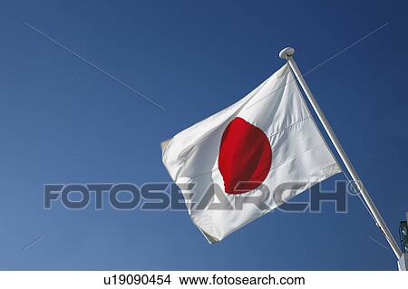 Picture - Japanese Flag Against Clear sky. Fotosearch
